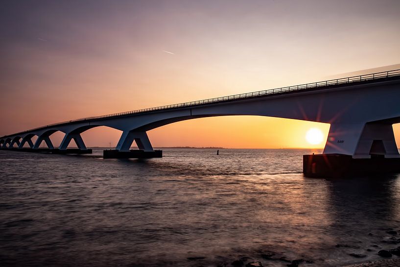 The Zeelandbrug, Zeeland (Netherlands) at sunrise. by Gert Hilbink
