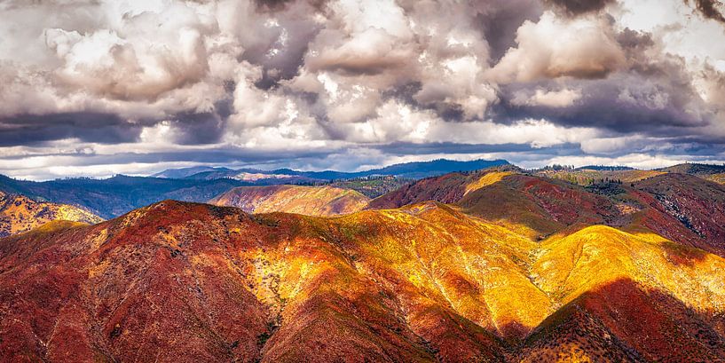 Brown hill range with clouds in Sierry Nevada California by Dieter Walther