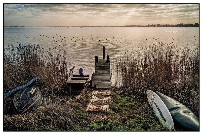 old boats on the waterfront by nol ploegmakers