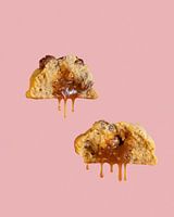 Kekswolken schweben im rosa Himmel