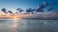 Ebbe am Strand von Terschelling bei Sonnenuntergang