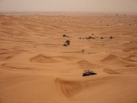 Jeep and car wreck in Dubai desert