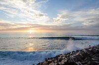 Golven bij zonsondergang