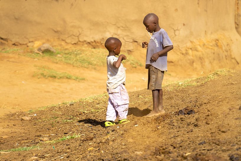 Children playing on the dry land of Kenya. by Monique van Helden