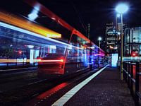 Tram by night for the skyline of The Hague