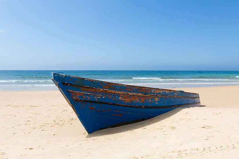 Old boat on the beach by Frank Herrmann
