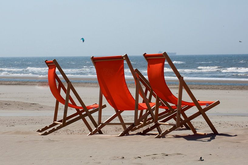 Orange beach chairs by the sea by Blond Beeld