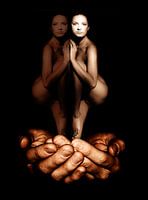 Woman with her reflection in protective hands.