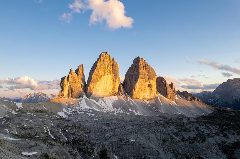 Three peaks at sunset glow Tre Crime Glow by Daniel Kogler