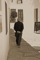 Spanish older man in white village Frigiliana