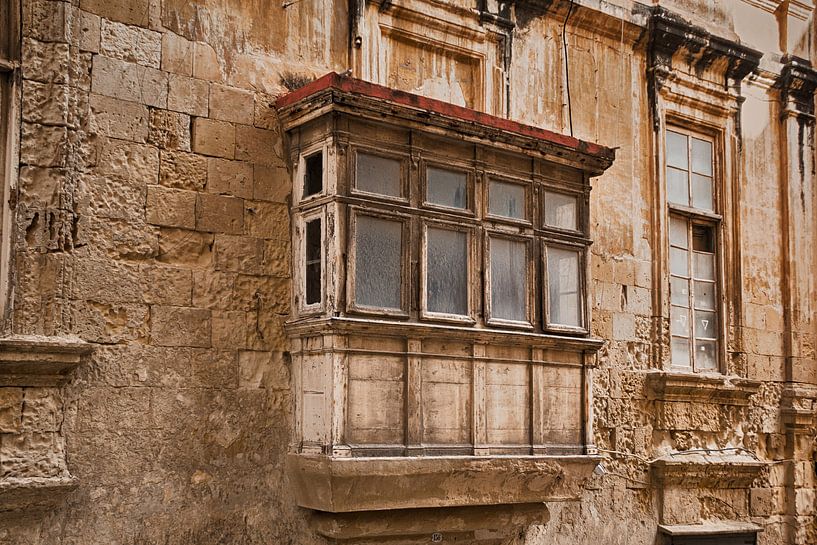 Old wooden overhanging conservatory balcony by Yke de Vos
