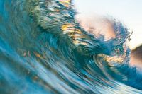 Breaking wave during sunset