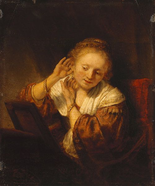 Jeune femme avec des boucles d'oreilles, Rembrandt par Rembrandt van Rijn
