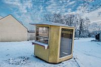 Dilapidated kiosk in the cold
