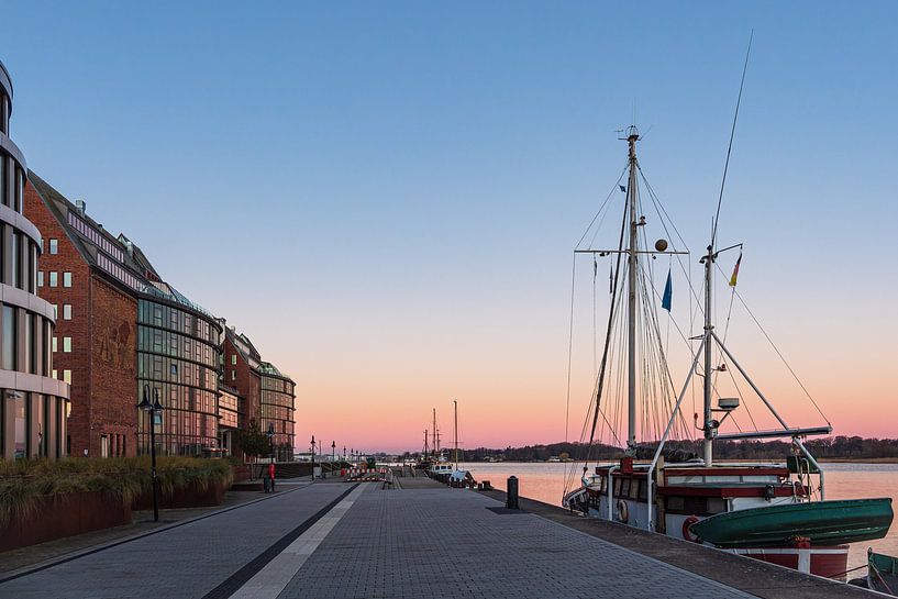 The city harbour in the early morning in the Hanseatic city of Rostock by Rico Ködder