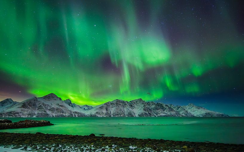 Northern lights over fjord in northern Norway by Chris Stenger