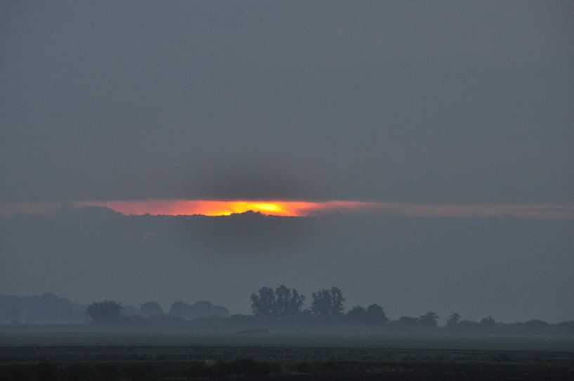 opkomende zon tussen de wolken par Marten Wieringa