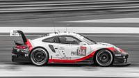 Black / white / red Porsche Le Mans