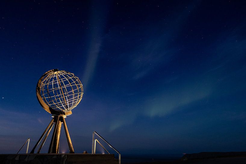 The Northern Lights over the North Cape. by Menno Schaefer