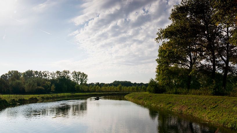 The Dommel with a nice reflection of the clouds in the water by Lieke van Grinsven van Aarle