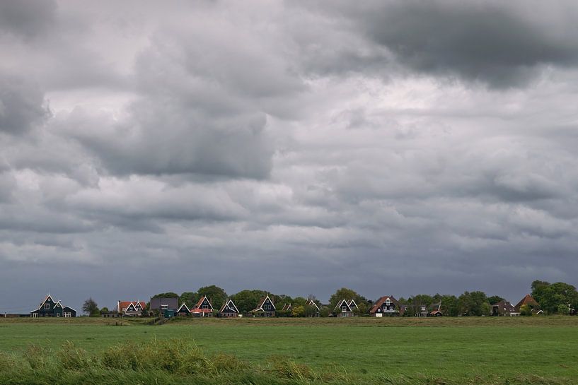 Dark sky over the village by MMFoto