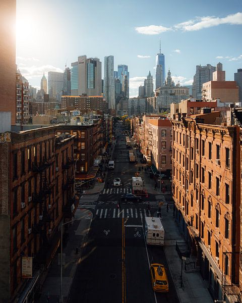 Sunrise over Manhattan with iconic taxi by Ian Schepers