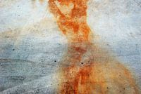 Weibliche Figur in Orange