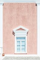 Pink wall and a pediment