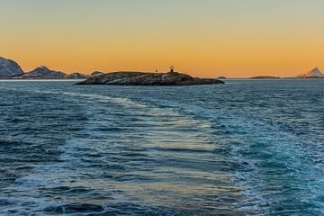 Passing the Arctic Circle during cruise with Hurtigruten at sunrise in winter in Norway by Robert Ruidl