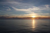 Zonsondergang op zee