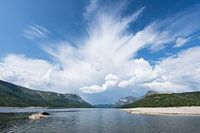 Mountain lake in Norway under a cloudy sky