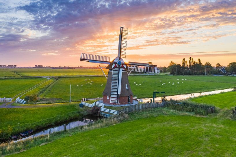 Polder mill De Jonge Held at Sunrise by Droninger