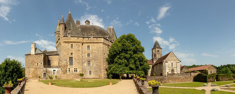 Gardens and church of Château de Jumilhac in Dordogne, France by Joost Adriaanse
