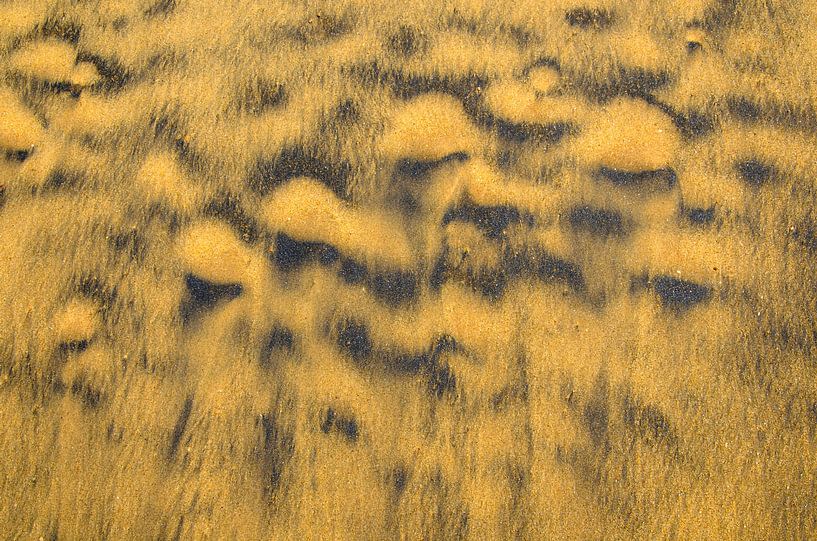 Waves pattern in the sand on the beach by Dieter Walther