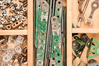 Meccano parts in wooden box
