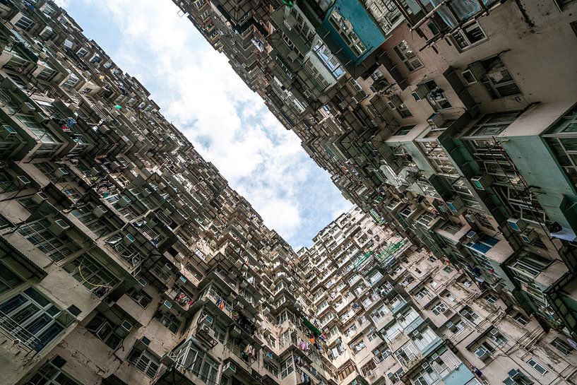 Dense buildings in Hong Kong with air by Mickéle Godderis