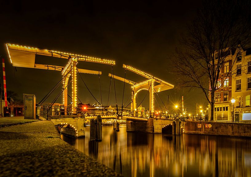 Bridge over the canal in Amsterdam by Sandra Kuijpers