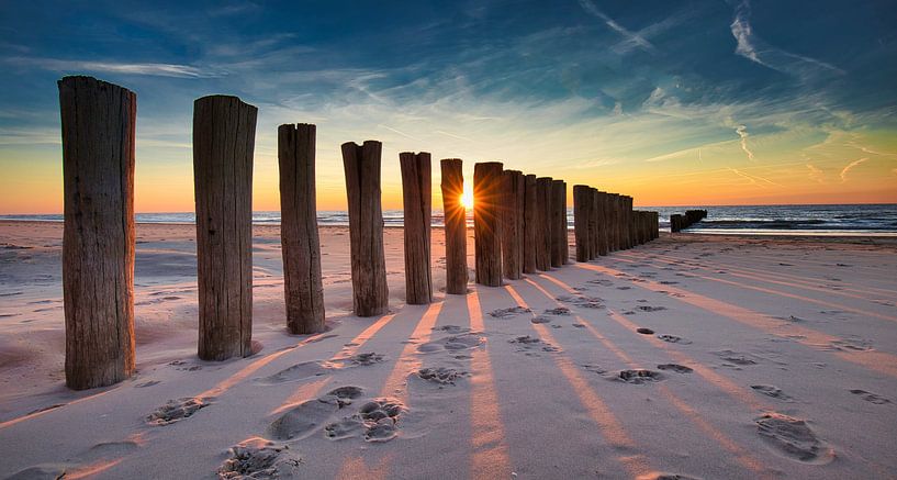sunset through the posts at De Ker by peterheinspictures