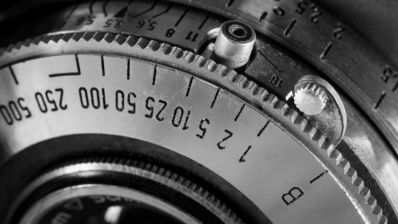 Detail of shutter speed ring on vintage camera by Robin Jongerden