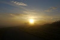 Landschap met opkomende zon