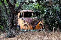 A rusted abandoned t1 volkswagen van