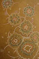 Fractal flowers on a plain brown background 