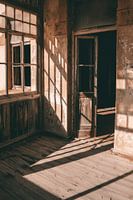 Light and shadows in ghost village of Kolmanskop in Namibia