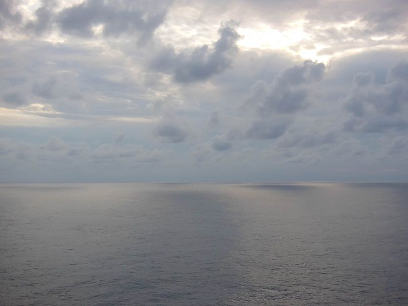 Zon door de wolken by Ricky Mc Cracken