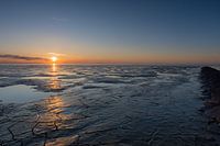Rest on the Wadden Sea near Koehool with structure in the ground