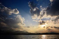 Clouds over alpine lake