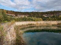 Lake with water reflections at former Enci limestone quarry in Limburg