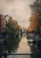 A very calm canal in the direction of Rijks museum in Amsterdam