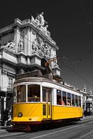 Lisbon, Portugal. Vibrant Classic Yellow Tram and Rua Augusta Street Monumental Arch. B/W Selective Color