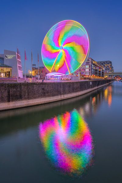 Ferris wheel in Cologne in the evening by Michael Valjak
